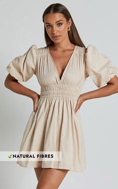 Get ready to turn heads in the Francesca V Neck Puff Sleeves Mini Dress! This neutral, A Line dress is made from 100% cotton for a comfortable and breathable fit. The flattering V neck adds a touch of elegance, while the puff sleeves add a playful and feminine twist. Perfect for any casual occasion, this mini dress is your go-to choice when you want to feel effortlessly stylish. Pair it with your favorite accessories and get ready to slay the fashion game!Product Details:A-line dress silhouetteM Chic Cotton Puff Sleeve Dress, Cotton Puff Sleeve Mini Dress For Day Out, Cotton Mini Dress With Puff Gathered Sleeves, Cotton Puff Sleeve Dress For Day Out, Cotton Midi Dress With Puff Sleeves, Cotton Ruched Puff Sleeve Dress For Brunch, Cotton Midi Dress With Smocked Back And Puff Sleeves, Cotton Ruched V-neck Midi Dress, Cotton Puff Sleeve Dress For Brunch With Gathered Sleeves