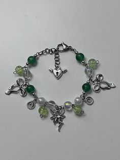 Cute Chain bracelet I called the Green Fairy Bracelet  Made from Stainless Steel  Perfect gift for friends and family🌸🤗 Green Aesthetic Bracelets, Fairy Charm Bracelet, Green Friendship Bracelets With Colorful Beads, Cheap Green Beaded Jewelry, Cute Green Bracelet, Cheap Green Charm Bracelet For Friendship, Cheap Green Holiday Bracelets, Cheap Green Beaded Bracelets For Birthday, Fairy Jewelry Bracelet