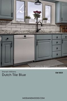 a kitchen with blue cabinets and white counter tops is featured in the color she wrote, dutch tile blue