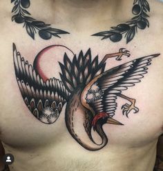 a chest with an eagle and bird tattoo design on it's left side ribcage