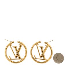 These are a fabulous pair of LOUIS VUITTON Louise Hoop Earrings in Gold . These distinctive hoop earrings feature LV logos inside the circle in a gold finish. Louis Vuitton Jewelry, Hoop Earrings Gold, Earrings In Gold, Authentic Louis Vuitton, Earrings Gold, Gold Finish, Gold Earrings, Dust Bag, Hoop Earrings