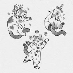 three cats are playing with bubbles in the air