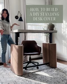 a woman standing in front of a desk with a chair on top of it and the words how to build a diy standing desk cover