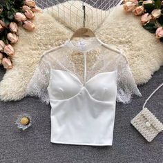 Lace halter neck top, hollow through short sleeves slim bottom shirtMaterial:blendedStyle:sexyFeatures:lace,see shroughColor:black,whiteSize(cm):free 1inch=2.54cmlength:43,bust:60-94,waist:60-84&ltp&gtNote:Due to different measurement methods,there will be 1-3 error(unite:cm), please understand.</p>&ltbr/> Chic Short Sleeve Crop Top For Summer, Fitted Hollow Out Mesh Top For Summer, Summer Party Mesh Top With Lace Trim, Stretch Hollow Out Mesh Top For Summer, Stretch Mesh Top With Hollow Out Details For Summer, Stretch Mesh Top With Hollow Out For Summer, Summer Stretch Mesh Top With Hollow-out Details, Elegant Summer Lace Mesh Top, Summer Party Tops With Hollow Out Details