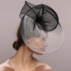 Black and White 'Pagoda' Shape Derby Hat by DIVA HATS. Exclusive Haute Couture Accessory. Women head accessories for weddings, routs, parties, derby. Ready-to-wear hats that respond to all the latest trends in fashion. This charming handcrafted Black&White Kentucky derby hat glorifies your personality and enhances the positivity of your etiquette on all occasions. Whether you are attending a wedding reception, Kentucky derby, or visiting any other formal or informal event Adjustable Short Brim Mini Hat For Church, Adjustable Cloche Headpiece For Church, Handmade Mini Hats For Royal Ascot, Handmade Hat Headpieces For Evening, Adjustable Church Hat Headpiece, Elegant Handmade Hat For Gift, Elegant Handmade Hat As A Gift, Adjustable Church Headpiece Hat, Handmade Elegant Hat As Gift