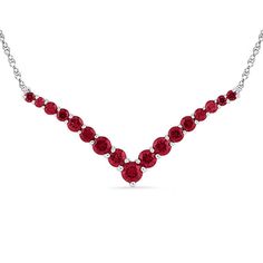 Treat the July-born birthday girl to a glamorous fashion necklace she'll adore. Fashioned in sleek 10K white gold, this intriguing design features an array of oval lab-created bright red rubies arranged in a chevron-shaped drop. This eye-catching look is buffed to a brilliant luster and suspends centered along an 18.0-inch rope chain that secures with a spring-ring clasp. Classic Necklace With Lab-created Ruby, Classic Ruby Necklace With Diamond Cut, Elegant Round Lab-created Ruby Necklace, Elegant Round Lab-created Ruby Necklaces, Elegant Round Necklace With Lab-created Ruby, Fine Jewelry Red Ruby Necklace, Elegant Silver Necklace With Lab-created Ruby, Formal Ruby Necklace For Valentine's Day, Formal Ruby Birthstone Necklace