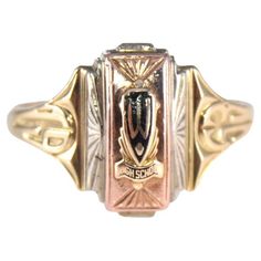 UNISEX RING STYLE / REFERENCE: Art Deco Signet Ring METAL / MATERIAL: 10Kt. Solid Gold Multi Colored Rose, Yellow, White CIRCA / YEAR: 1953 SIZE: 10.25 This classic Art Deco ring is hand constructed for a high school, likely back east in solid 10Kt Gold. The size is 10 1/4. The ring has a stylized date on the sides and is done with a black enamel inlay on the top with the letter W, which was clearly the high school, but I do not know more than that. Nearly 25 years ago I purchased a collection o Retro Yellow Gold Rings Stamped 14k, Yellow Gold Engraved Ring, Art Deco, Collectible, Collectible Yellow Gold Engraved Ring In Art Deco Style, Art Deco Yellow Gold Engraved Ring, Collectible Art Deco Engraved Yellow Gold Ring, Retro 14k Gold Rings, Retro Yellow Gold Ring Jewelry, Retro Yellow Gold Ring, High School Rings