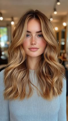 Maple blonde is a warm, rich shade that combines golden blonde with hints of caramel and auburn, perfect for a cozy, autumn-inspired look. This inviting color adds depth and warmth to your hair, making it ideal for any season. Click the pin and follow us for more gorgeous blonde inspirations! #MapleBlonde #WarmHairColors #HairColorInspo #BlondeGoals #AutumnVibes Blonde Hair Auburn Lowlights, Auburn To Blonde Balayage, Cool Toned Copper Hair, Maple Hair Color, Ginger Blonde Balayage, Copper Lowlights In Blonde Hair, Auburn Blonde Balayage, Blonde Hair With Auburn Lowlights, Warm Blonde Highlights On Brown Hair