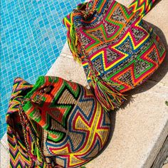 100% Authentic Wayuu Bag Handcrafted By Indigenous Tribe In Colombia. Each Bag Is Unique Art Work That Follows Hundred Years Of Traditions And Believes Of The Tribe. Bag Are Approximately 9 To 13 Inches In Diameter And Depth The Strap Measure Between 32 And 40 Inches. One Of A Kind New Without Tags. Woven Vacation Backpack, Multicolor Hobo Bag With Removable Pouch For Vacation, Handmade Beach Backpack, Natural Woven Backpack, Casual Festival Bucket Bag, Multicolor Pouch Bucket Bag For Beach, Multicolor Handwoven Hobo Bag For Travel, Multicolor Bucket Bag With Removable Pouch For Beach, Multicolor Woven Crossbody Bucket Bag