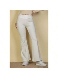 Introducing our "Elegant Flow" High Waisted Flared Pants, a must-have staple for every fashion-forward wardrobe. These pants offer a perfect blend of style and comfort, crafted from a soft, sleek, and medium-weight stretch novelty premium knit fabric.Key Features:
- Fabric: Soft, sleek, and medium-weight stretch novelty premium knit
- Fit: High waisted with a flattering flared leg silhouette
- Color Options: Available in classic black, navy blue, and charcoal gray
- Sizes: Available in XS, S, M, Chic Solid Color Sweatpants, Trendy Solid Color High Stretch Bottoms, Non-stretch Solid Color Bottoms For Fall, Chic High-waisted Solid Sweatpants, Chic Wide Leg Solid Color Sweatpants, Solid Color Stretch Sweatpants For Loungewear, Stretch Solid Color Sweatpants For Loungewear, Stretch Sweatpants In Solid Color For Loungewear, High Waist Yoga Pants With 4-way Stretch For Spring