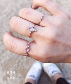 "The incredible hints of blue, pink, and purple that this ring picks up in the sunlight make it almost so gorgeous, it feels like magic. Our moonstone \"Talisman\" ring is set in 14K gold and features 5 prong set rainbow moonstones. - Handcrafted out of solid 14K gold - Choose between rose, yellow and white gold - Round band measures 1mm - Moonstones measure 2mm, 3mm and 4mm (5 stones total) For our opal \"Talisman\" ring click here: https://www.etsy.com/listing/558045215/14k-opal-talisman-ring- Rose Gold Moonstone Jewelry With Gemstone, Rose Gold Moonstone Gemstone Jewelry, Round Pink Opal Jewelry For Gifts, Pink Opal Jewelry For Gifts, Round Rose Quartz Promise Ring, Pink Moonstone Jewelry Gift, Dainty Pink Opal Gemstone Jewelry, 14k Gold Pink Gemstone Jewelry, Pink 14k Gold Jewelry With Gemstone Accents