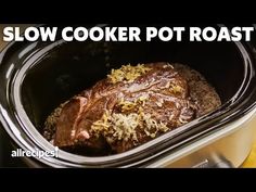 the slow cooker pot roast is ready to be cooked in the crockpot