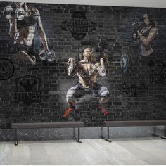 a brick wall with an image of a man doing exercises