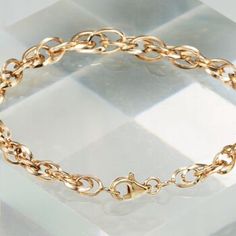 Ross-Simons - 14kt Yellow Gold Interlocking Double-Oval Link Bracelet. 8". The interlocking pattern of this handcrafted 14kt yellow gold bracelet creates a textural style with plenty of shine. Oval links double up and intertwine. Dressed up or down, it always looks just right. Lobster clasp, 14kt yellow gold double-oval link bracelet. Gold Oval Link Cable Chain Bracelet, 14k Gold Oval Link Bracelet For Anniversary, Timeless Oval Gold Chain Jewelry, Oval Rose Gold Bracelet For Gift, Anniversary Jubilee Chain Bracelet With Oval Links, Elegant Gold Bracelet With Cable Chain In Oval Shape, Gold Oval Link Bracelet For Anniversary, Elegant Oval Gold Cable Chain Bracelet, Elegant Oval Gold Bracelet With Cable Chain