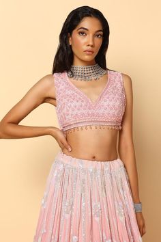 Pink lehenga in viscose georgette featuring floral, sequins and pearl embroidery. Paired with a sleeveless padded blouse and a matching dupatta., Fit: Relaxed Pearl Embroidery, Padded Blouse, Net Lehenga, Pink Lehenga, Bridal Lehengas, V Neck Blouse, Bridal Lehenga, Embroidered Blouse, Set Women