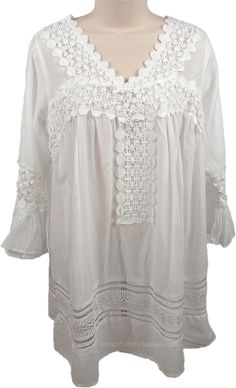 Summer Tunic Top with Crochet Lace - Let your free spirit loose in this airy tunic that floats weightlessly over sun-kissed skin.  A fresh new glorious top that is easy and exotic, this distinctive cotton tunic is perfect for casual wear. #tlb #White #XLPlus Bohemian V-neck Lace Top For Vacation, Summer Cotton Lace Top For Vacation, White Cotton Lace Summer Tops, Cotton Lace Top For Summer Vacation, Summer V-neck Top With Lace Work, Beach Cotton Tops With Lace Trim, Summer Cotton Tops With Lace Work, Spring Beachwear Tops With Crochet Trim, Summer Cotton Lace Top With Lace Trim