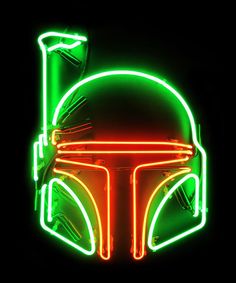 a star wars neon sign with the helmet of boba fett