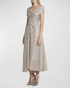 Talbot Runhof dress in draped metallic sequin voile    Approx. 49"L from shoulder to hem    Offtheshoulder neckline    Short sleeves    Fitandflare silhouette    Hem falls below the knee    Invisible back zip    Polyester    Made in Germany Party Midi Dress With Pleated Bodice And Off-shoulder Design, Elegant One-shoulder Metallic Dress, Metallic One-shoulder Cocktail Dress, Elegant Sequined Off Shoulder Dress For Evening, Elegant Sequined Off Shoulder Evening Dress, Formal Dresses With Sequins And Asymmetrical Neckline, Sequined Evening Dress With Asymmetrical Neckline For Formal Occasions, Metallic Midi-length Dress For Gala, Formal Evening Dress With Sequins And Asymmetrical Neckline