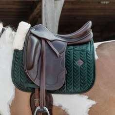 a close up of a saddle on a horse