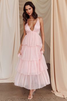 Auguste Tiered Frill Midi Dress Blush Ruffled V-neck Maxi Dress For Wedding Guest, V-neck Ruffled Maxi Dress For Prom, Party V-neck Maxi Dress With Ruffled Skirt, Tiered Ruffle Maxi Dress For Prom, Tiered Ruffle Maxi Dress For Prom Season, Feminine Ruffled Straps Prom Dress, Backless Ruffled Dress For Prom, Backless Ruffled Prom Dress, Feminine Prom Dress With Ruffled Straps