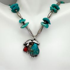 Vintage Southwestern Turquoise Coral Sterling Silver Necklace. Gorgeous Turquoise Coral Sterling Silver Pendant In Traditional Design On Necklace Of Sterling Silver Tube Beads With Turquoise Nuggets. Probably Navajo. Hook And Loop Closure. Necklace Is 18 Inches. Pendant Is 24 X 28 Mm. Turquoise Is 15 X 18 Mm, Coral Is 6 X 7. Largest Nugget Is 10 X 13 Mm. 31.2g Silver Southwestern Multi-stone Turquoise Necklace, Southwestern Silver Turquoise Multi-stone Necklace, Coral Turquoise, Tube Beads, Hook And Loop, Turquoise Jewelry, Sterling Silver Necklace, Jewelry Vintage, Sterling Silver Pendant