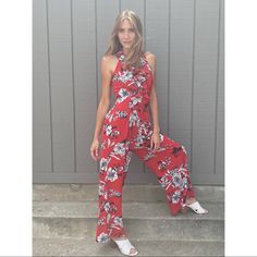 Truth + Wisdom Ruffle V-Neck Flowered Red Jumpsuit Casual Red V-neck Jumpsuits And Rompers, Casual Red V-neck Jumpsuit, Red Floral Print Jumpsuit With V-neck, Chic Red Floral Print Jumpsuit, Chic Red Jumpsuits And Rompers For Summer, Summer Floral Print Red Jumpsuits And Rompers, Red Floral Print Jumpsuits And Rompers For Summer, Red V-neck Jumpsuits And Rompers For Spring, Red Jumpsuits And Rompers For Summer Day Out