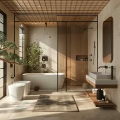 a bathroom with a bathtub, sink and toilet next to a tree in the corner