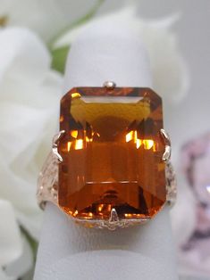 Orange Citrine Ring, Edwardian style, rose gold filigree, with flared prong detail, Treasure design Classic Rose Gold Topaz Ring For Formal Events, Classic Rose Gold Topaz Ring For Formal Occasions, Rose Gold Topaz Rings In Fine Jewelry Style, Elegant Amber Topaz Promise Ring, Elegant Hallmarked Orange Ring, Elegant Orange Hallmarked Ring, Elegant Orange Topaz Wedding Ring, Elegant Amber Topaz Ring For Anniversary, Rose Gold Topaz Gemstone Ring As Gift