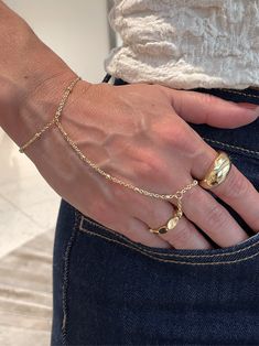 Elevate your style with our Cecilia bracelet. This trending piece boasts a gold-plated design that adds a touch of sophistication to any outfit. Stand out from the crowd and make a statement with this must-have accessory. Ring Bracelet, Earring Necklace, Ring Gift, Necklaces Bracelets