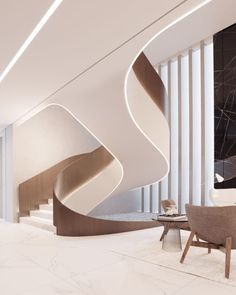 the interior of a modern building with white and brown decor