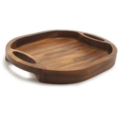 the wooden tray is shaped like an oval