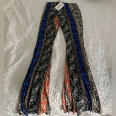 Size Small Bohemian Blue Pants For Fall, Blue Bottoms For Fall Festival, Bohemian Orange Bottoms For Fall, Trendy Blue Pants For Festival, Trendy Blue Festival Pants, Orange Stretch Bottoms For Festival, Bohemian Multicolor Bottoms For Fall, Orange Bohemian Fitted Bottoms, Orange Fitted Bohemian Bottoms