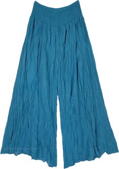 As bright as day with a clear blue sky, these cool teal shaded pants are easy and breezy for the summertime.  These pants are extremely comfortable and are made of lightweight cotton fabric. #tlb #SplitSkirtsPants #Crinkle #vacationclothing #beachwrap #bohemianfashion #WideLegPants #BluePants #HippiePants Beach Cotton Harem Pants In Solid Color, Beach Harem Pants In Solid Cotton, Beach Cotton Harem Pants, Beach Wide Leg Cotton Pants, Comfortable Summer Harem Pants, Breezy Blue Bottoms For Spring, Summer Washed Blue Wide-leg Pants, Comfortable Full-length Summer Harem Pants, Breezy Wide Leg Cotton Bottoms