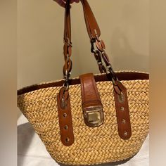 Michael Kors Santorini Straw Bag! Used Twice And In Great Condition! $298 Brand New 20” L X 11” W X 9” H Designer Everyday Straw Bag With Leather Handles, Natural Color Bags With Gold-tone Hardware For Shopping, Designer Double Handle Straw Bag For Everyday, Classic Beige Shoulder Bag With Braided Handles, Designer Bags In Natural Color With Gold-tone Hardware, Beige Straw Shopping Bag With Handle Drop, Casual Bags With Branded Hardware And Double Handle, Designer Brown Shoulder Bag For Vacation, Casual Bags With Double Handle And Branded Hardware