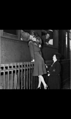 black and white photograph of two women standing next to each other