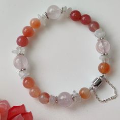 NEXT DAY SHIPPING A chic bracelet is perfect and unique, whether color matching or design. Orange-red agate and pink rose quartz crystals, paired with rough moonstone, make the whole bracelet look very charming and eye-catching, such a lovely gift for friends and family members. Please don't hesitate to contact me with any questions at all. View more items in my shop      https://www.etsy.com/shop/TTanGadgets All images are copyrighted by TTANGADGETS . All rights reserved Bohemian Pink Agate Bracelets, Casual Pink Bracelets With Natural Stones, Minimalist Pink Round Bracelet, Pink Agate Beaded Bracelets, Pink Agate Jewelry With 8mm Beads, Agate Bracelets As A Gift, Moonstone Bracelets With Natural Stones As Gift, Pink Agate Hand-strung Bracelets, Agate Bracelets With Natural Stones As Gift