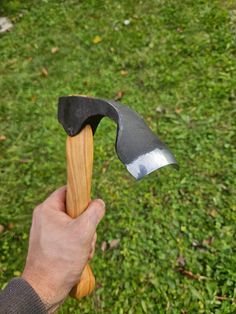 Short Bowl Carving Adze is used in woodworking, carpentry, mainly making wooden bowls, spoons and other blanks that require gouging out material in depth. This tool is all forged by hand from a solid piece of high carbon tool steel AISI standard 1080, fully hardened, polished and razor sharp!  Handle is hand carved from ash wood, and secured with a wedge, and sealed with tung oil.  Overall length top to bottom is 26cm / 10'' The width of the blade at the widest point is around 55mm /2'' Depth of Wooden Mug, Green Woodworking, Tung Oil, Tool Knife, Carving Tools, Tool Steel, Engraved Logo, Leather Sheath, Wooden Bowls