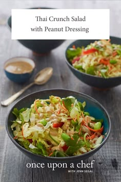 three bowls filled with salad on top of a wooden table