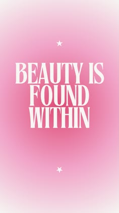 the words beauty is found within against a pink background