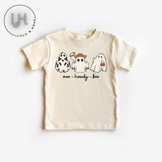 Retro Ghost Moo Howdy Boo - Halloween Shirt - Baby Toddler & Kids Size Get ready to make this Halloween unforgettable for your little ones with our exclusive Retro Trio Ghost Halloween Shirts! Designed to add a dash of spooky nostalgia to their festive attire, these shirts are available in toddler and youth sizes, ensuring a perfect fit for every age. Crafted with care and sustainability in mind, these shirts come in three charming tee color options: Deep Heather Grey, Natural, and White. 👻 Ret Toddler Boy Halloween Shirt, Playful Cartoon Print T-shirt For Fall, Cute Halloween Shirt With Graphic Print, Cute Halloween Graphic Print Shirt, Cute Halloween Short Sleeve Shirt, Cute Short Sleeve Halloween Shirt, Playful Crew Neck Tops For Halloween, Playful Cotton Tops For Halloween, Cute Halloween Tops With Character Print