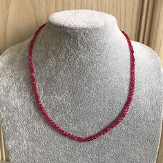 Ruby necklace. This is a faceted round shape beaded Ruby necklace. The Ruby necklace has a Silver lobster claw fastening . I can send this Ruby necklace to you or to someone else anywhere in the world with your message. Dimensions  Necklace length 18 inches  Necklace width 4mm An ideal gift for Birthday, Weddings jewellery Bridesmaids gift, Anniversary gift, Graduation gift,Holiday jewellery and Everyday . Contact  You can contact me anytime on my shop email with any questions, order and request, Wedding Bridesmaid Jewelry, Ruby Beads, Ruby Necklace, Valentines Gifts For Her, Holiday Jewelry, Birthday Gift For Her, Valentine Gift, Bridesmaid Jewelry, Handmade Necklace