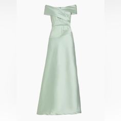 a light green dress with an off the shoulder design