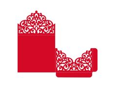 a red paper cutout with an ornate design on it's back and sides