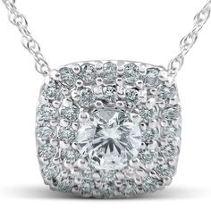 This womens high quality pendant features a 3/4ct center round cut diamond and 33 round cut accent diamonds. All diamonds are prong set in solid 14k white gold high polished mounting. An 18" chain is included. Color: gold/white. Gender: female. Age Group: adult. White Diamond Necklace With Pave Setting, Round Cut, White 14k Gold Necklace With Diamond Accents, White Necklace With Diamond Accents In 14k Gold, Anniversary Lab Grown Diamond Necklace With Halo Setting, Diamond Solitaire Necklace With Pave Setting, Round Cut Diamond Solitaire Necklace With Pave Setting, Dazzling Diamond Necklace With Round Cut Accents, Dazzling Lab Grown Diamond Necklace With Accents, Lab Grown Diamond Necklace With Round Cut Accents