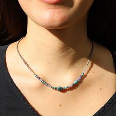 Cool, unique necklace, that will update any outfit! Made with genuine Turquoise and Tanzanite. Delicate and lightweight, perfect for everyday wear! One size fits all. Made in the USA. Ships in 0-3 business days. Turquoise is associated with the Throat chakra and it represents knowledge and divine guidance. It is also an aide in communication, in synchronizing what we mean to say with what is actually said. Tanzanite is a very rare, and powerful crystal that can stimulate your Crown, Third Eye an Turquoise Crystal Necklaces For Healing, Blue Natural Stones Necklace For Everyday Wear, Blue Necklaces With Natural Stones For Everyday, Everyday Blue Necklaces With Natural Stones, Everyday Turquoise Beaded Necklaces With Gemstone Beads, Everyday Turquoise Beaded Necklace With Gemstone Beads, Everyday Turquoise Gemstone Necklace, Bohemian Blue Amazonite Turquoise Necklace, Bohemian Amazonite Turquoise Necklace