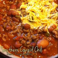 a bowl filled with chili, beans and cheese