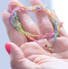 These are, to the best of my knowledge, the most intricate hand knotted rainbow in existence. I carefully pair tiny gemstone rondelles like Sapphire, Tsavorite, Tanzanite, and Zircon one millimeter at a time on corresponding colors of hand-dyed rainbow cord and knot between each bead. The result is a delicate wisp of wearable refracted light that's finished with solid 14k gold findings and the sweetest little heart shaped lobster clasp.  . . A personal note: This is a piece of deep personal sign Cheap Rainbow Necklaces For Jewelry Making, Cheap Handmade Rainbow Jewelry, Rainbow Multi-strand Jewelry For Gifts, Rainbow Multi-strand Necklace As Gift, Rainbow Multi-strand Necklace Gift, Rainbow Multi-strand Necklace For Gift, Refracted Light, Necklace Sapphire, Gold Schmuck