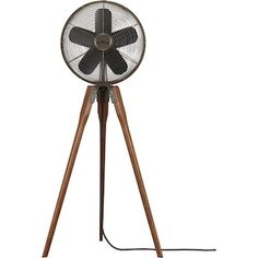 an old fashioned fan on a tripod stand