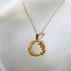 "DETAILS - Crafted with pure sterling silver and optional gold-plating OR pure solid gold - Chain style may vary slightly - Bail style may vary slightly - Pendant is approximately 3/4\" x 3/4\" - Made in New York VARIATIONS If you require any variation of this style (smaller or larger moon, longer chain, engraving, etc.) feel free to message us. We will do our best to accommodate you. Additional costs may apply depending on the variation. POLICY This item is made to order. Made to order items ar Modern Sterling Silver Moon-shaped Jewelry, Modern Sterling Silver Moon Jewelry, Fine Gold Jewelry With Moon Phase, Modern Crescent Moon Charm Jewelry, Luxury Sterling Silver Crescent Necklace, Mother's Day Necklace With Polished Finish, Fine Jewelry Moon-shaped Necklace For Anniversary, Fine Jewelry Moon Necklace For Anniversary, Celestial Gold Plated Necklace For Anniversary