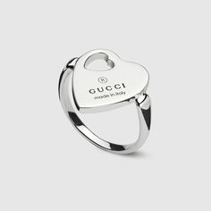 "The Gucci Trademark line combines motifs and hexagonal charms with the name of the House. From the cut-out heart to the padlock charm, playful symbols continue to distinguish a selection of rings, necklaces, bracelets and earrings for Pre-Fall 2024. This ring features the signature heart with a cut-out heart detail. 925 sterling silver, Heart with cut-out heart: 0.5\"W x 0.7\"H, Gucci Trademark engraving, Weight: 0.01lbs approximately, Made in Italy, Gucci guarantees, internally and within its